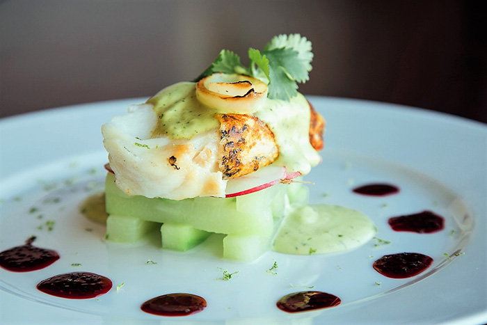 Avocado Hollandaise Sauce served with oven bake sea bass with Mexican Chayote and hibiscus chia seed gel by Chef Cesar Herrera of Illinois.